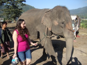 Emma helped lead one of the elephants up the hill, careful to keep her stuff out of the way.